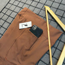 Short Olivia em Poliamida Liso - Com Bolso e Barra Para Corrida